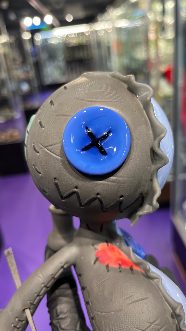 Muller Sitting Voodoo Doll